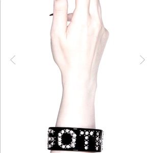Goth cuff bracelet. It has moon gemstones too on the inner wrist.
